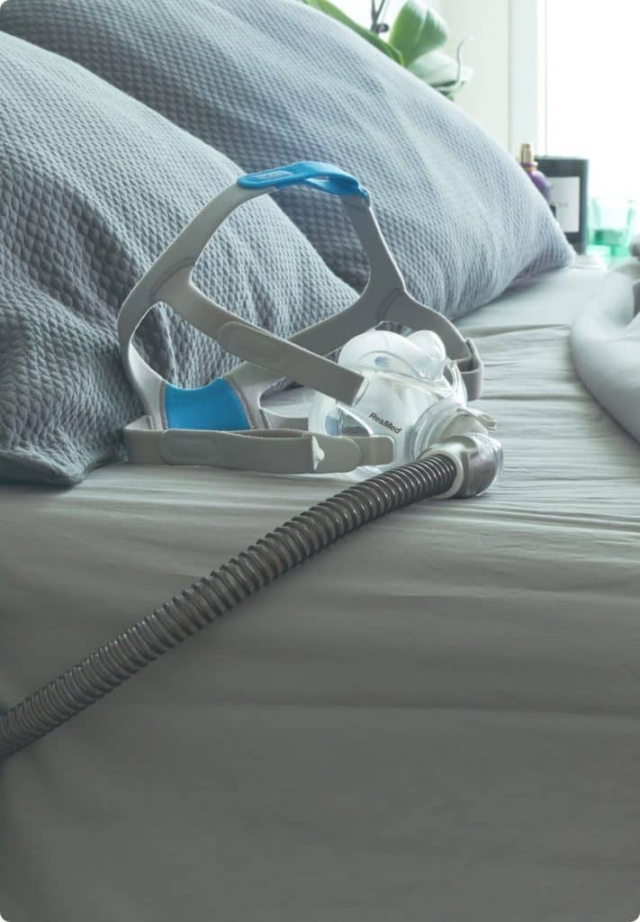 sleep-apnea-sleepapnea-cpap-mask-on-bed-v2